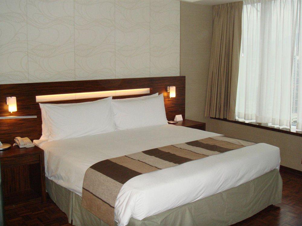 Nina Hotel Tsuen Wan West Hongkong Zewnętrze zdjęcie A bed