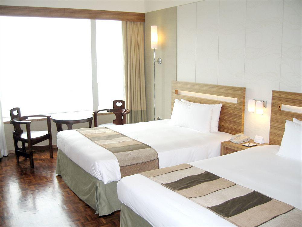 Nina Hotel Tsuen Wan West Hongkong Zewnętrze zdjęcie A room at the hotel